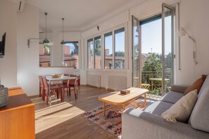 Apartment, Balcony, Partial Sea View | Living area | 32-inch flat-screen TV with cable channels