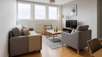 Apartment | Living area | 37-inch Smart TV with cable channels, Netflix, streaming services