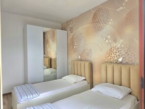2 habitaciones, tabla de planchar con plancha y wifi gratis