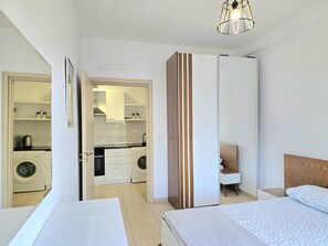 1 dormitorio, tabla de planchar con plancha, wifi gratis y ropa de cama