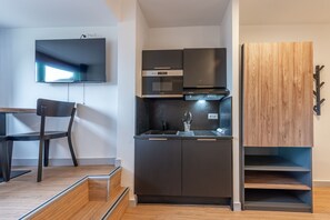 Chambre Deluxe double, salle de bain privée | Cuisine privée