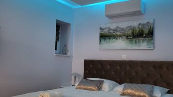 1 bedroom, desk, iron/ironing board, travel cot