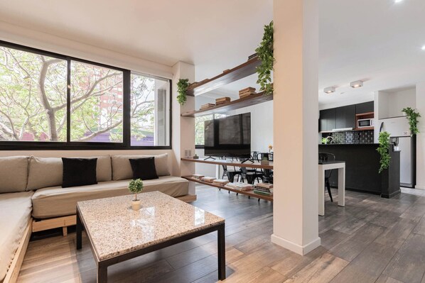 Suite Deluxe, vue ville | Coin séjour