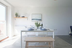 Apartment, Balcony, River View | In-room dining