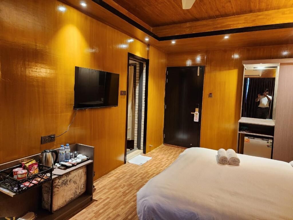 Douche, serviettes fournies, savon, shampoing