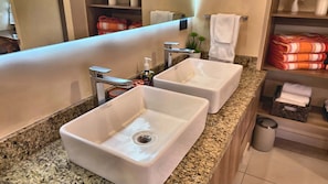 Shower, hair dryer, towels, shampoo