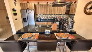 Coffee/tea maker, fridge, microwave, oven