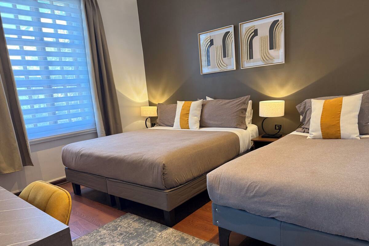Deluxe Triple Room, Multiple Beds | Down comforters, desk, WiFi (free), individually decorated