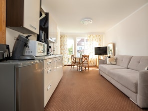 Apartment | Private kitchen | Highchair - Holiday Studio Close to the Seaside Beach (Rewal)