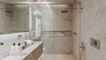 Shower, eco-friendly toiletries, hair dryer, towels