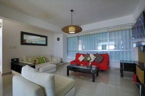 Deluxe Apartment, Patio | Living area