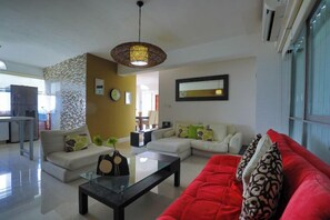Deluxe Apartment, Patio | Living area - Spacious Condo with Gym & Pool Cancun (Cancun)