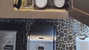 A kitchen cabinet with white plates, bowls, and cups neatly organized on shelves. - Cute House on Lake Hartwell- Dock Access!
PETS ALLOWED! (Townville)