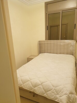2 slaapkamers, een strijkplank/strijkijzer, beddengoed