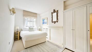 1 bedroom, desk, iron/ironing board, travel cot