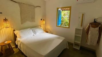 Suíte família, 1 cama de casal, vista para o jardim | 1 quarto, cortinas blackout, Wi-Fi de cortesia, roupa de cama