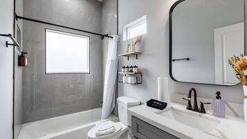 Hair dryer, towels, soap, shampoo