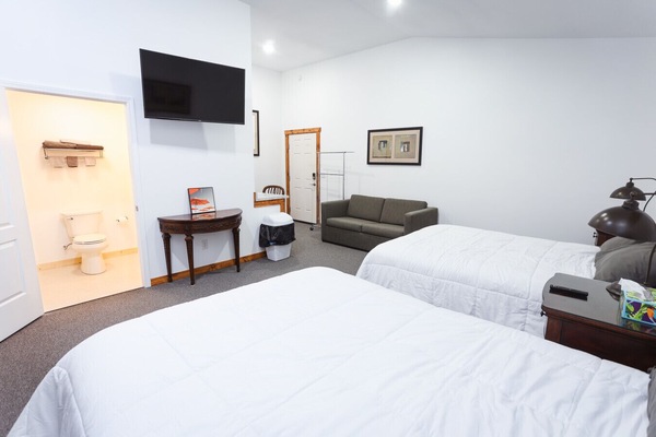 Two Queen Sized Bed and a Private Bathroom