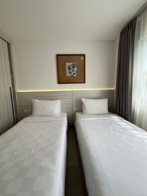 Vila, 2 quartos, piscina particular | Roupas de cama premium, frigobar, cortinas blackout, Wi-Fi de cortesia
