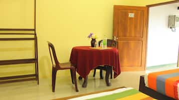 Deluxe Triple Room, Lake View | In-room dining