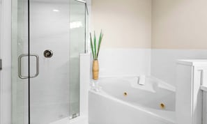 Shower, hair dryer, towels, shampoo