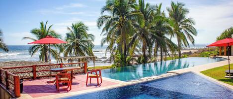 Outdoor pool, pool umbrellas, sun loungers