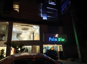 Front of property – evening/night - HOTEL PALM D'OR (New Delhi)