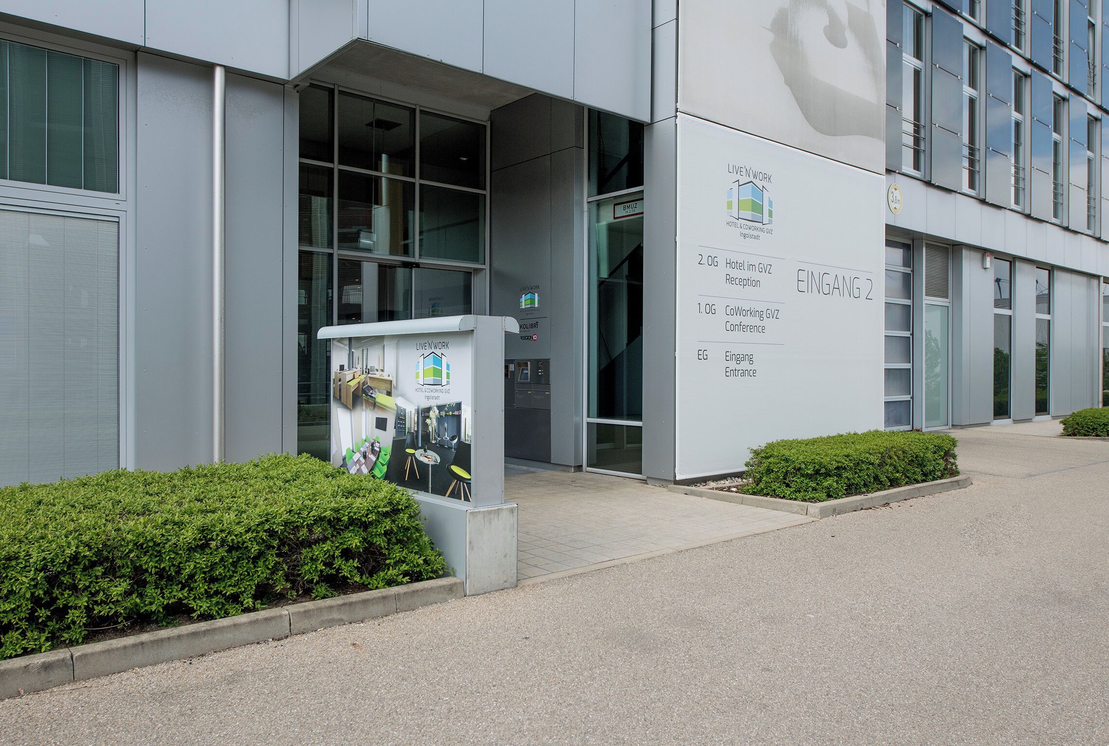 A modern building with a reception area, a conference room, and a children's play area.