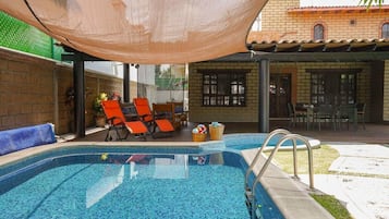 Outdoor pool, pool loungers