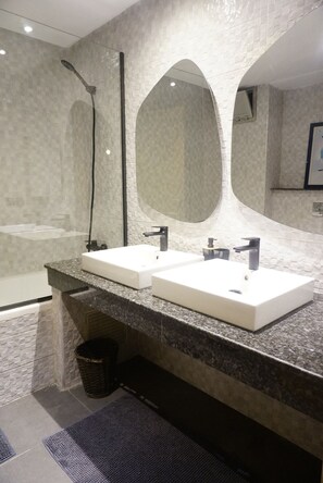 Bidet, towels, soap, toilet paper