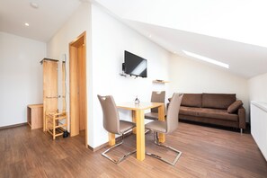 Condo, Balcony, Vineyard View | Living area | TV, toys - Weingut & Gästehof Borst (Nordheim a. Main)