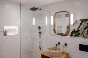 Shower, hair dryer, towels, soap