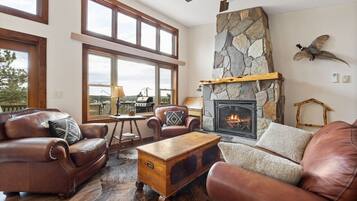 Smart TV, fireplace, foosball, books