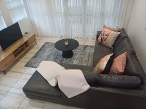Appartement, 2 chambres, fumeurs, balcon | Coin séjour