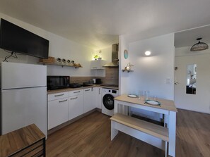 Fridge, microwave, stovetop, coffee/tea maker