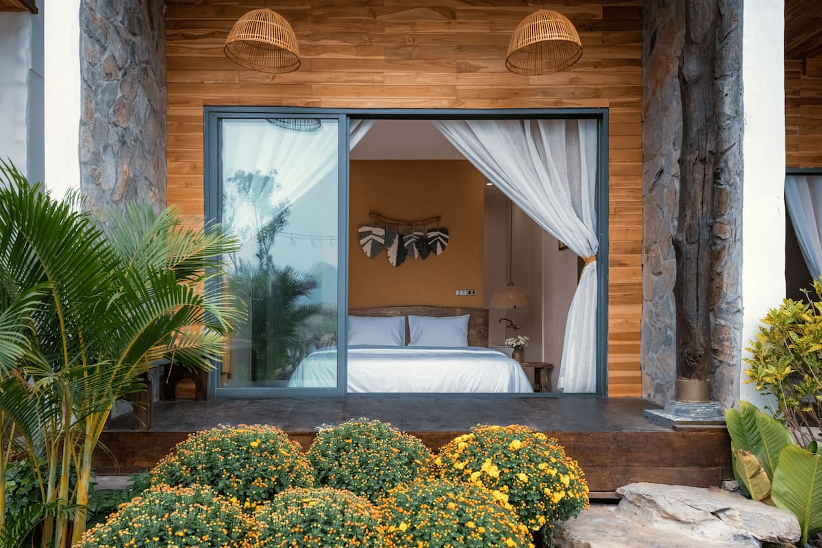 Doppia Luxury, vista giardino | Minibar con snack e bevande gratuite, insonorizzazione, Wi-Fi gratuito