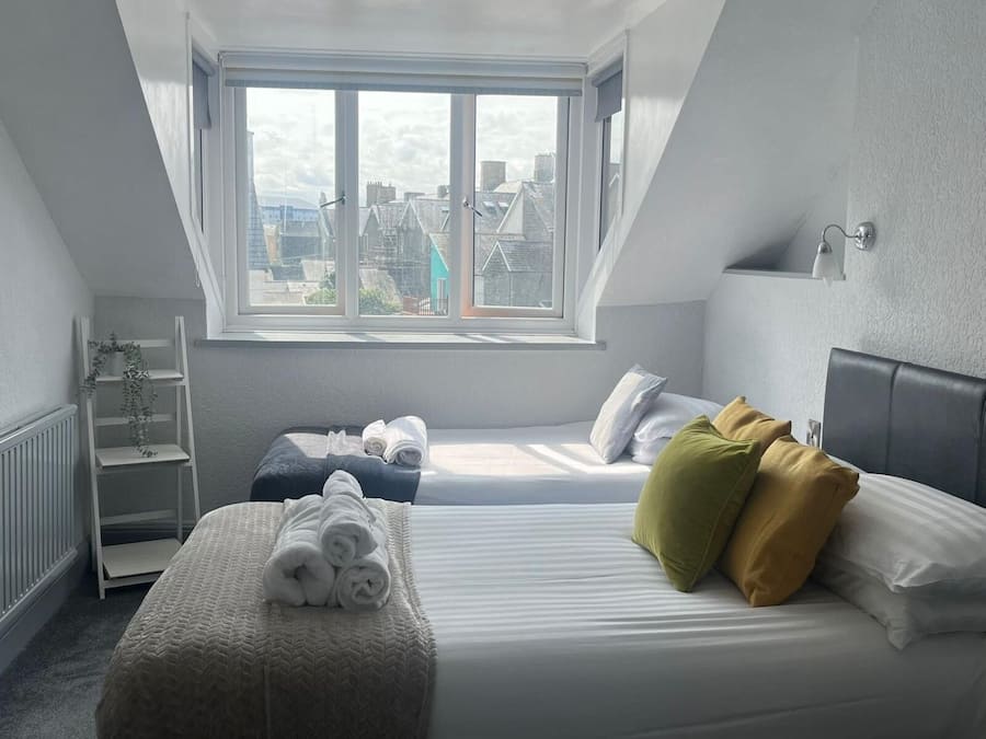 Triple Room, Partial Sea View | Desk, iron/ironing board, free WiFi