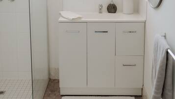 Hair dryer, towels, soap, shampoo