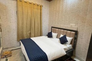 1 chambre, fer et planche à repasser, draps fournis