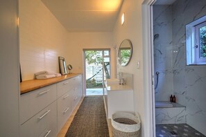 Shower, hair dryer, towels, soap