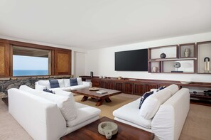 Smart TV, video games, DVD player, foosball
