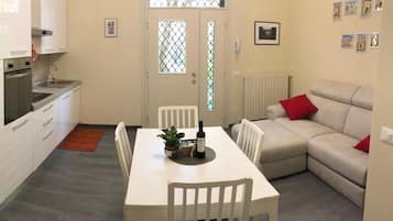 Apartment, 1 Bedroom, Terrace | Living area | 32-inch Smart TV with digital channels