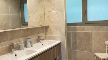 Shower, hair dryer, towels, soap