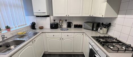 Fridge, microwave, oven, coffee/tea maker