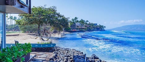 On the beach, sun-loungers, beach towels