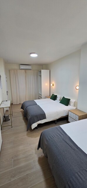 Quadruple Room, Balcony, City View | Down comforters, minibar, blackout drapes, soundproofing - Ola Málaga (Málaga)