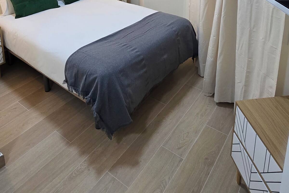 Triple Room, City View | Down comforters, minibar, blackout drapes, soundproofing