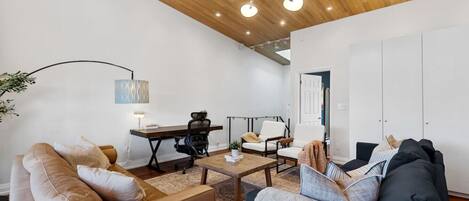 As you take a seat in the living room, the comfortable furniture and tasteful design make it easy to unwind.