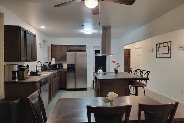 Dining area with seating for 10 and also has dinner tray tables