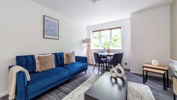 Apartment | Living area | 37-inch TV with cable channels, Netflix, streaming services